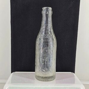 Vintage Clear Embossed Glass Bottle "Beauregard" Squirrel Graphic – Decor